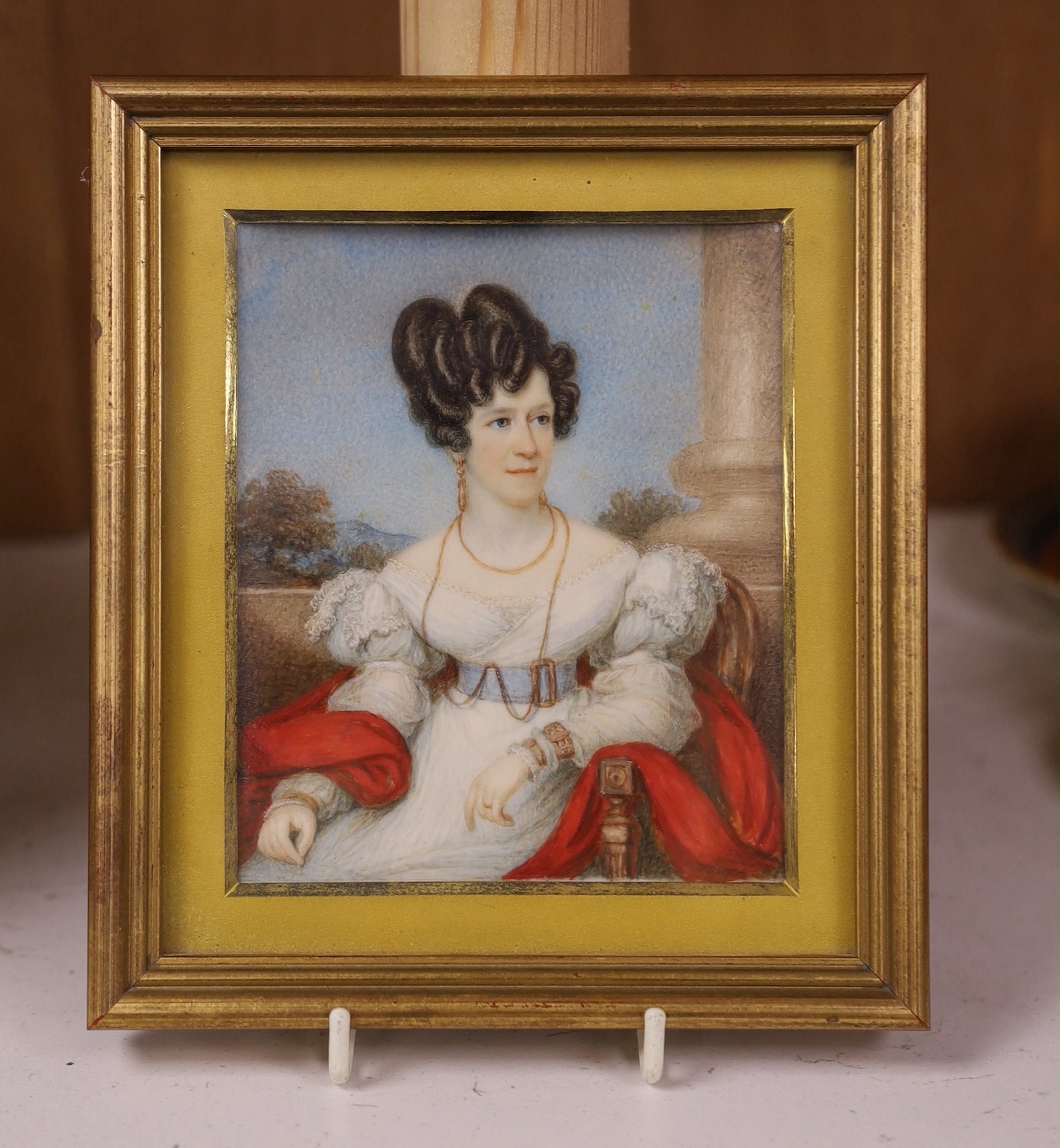 Victorian School, watercolour on ivory, Half length miniature of a seated lady, 11 x 9cm